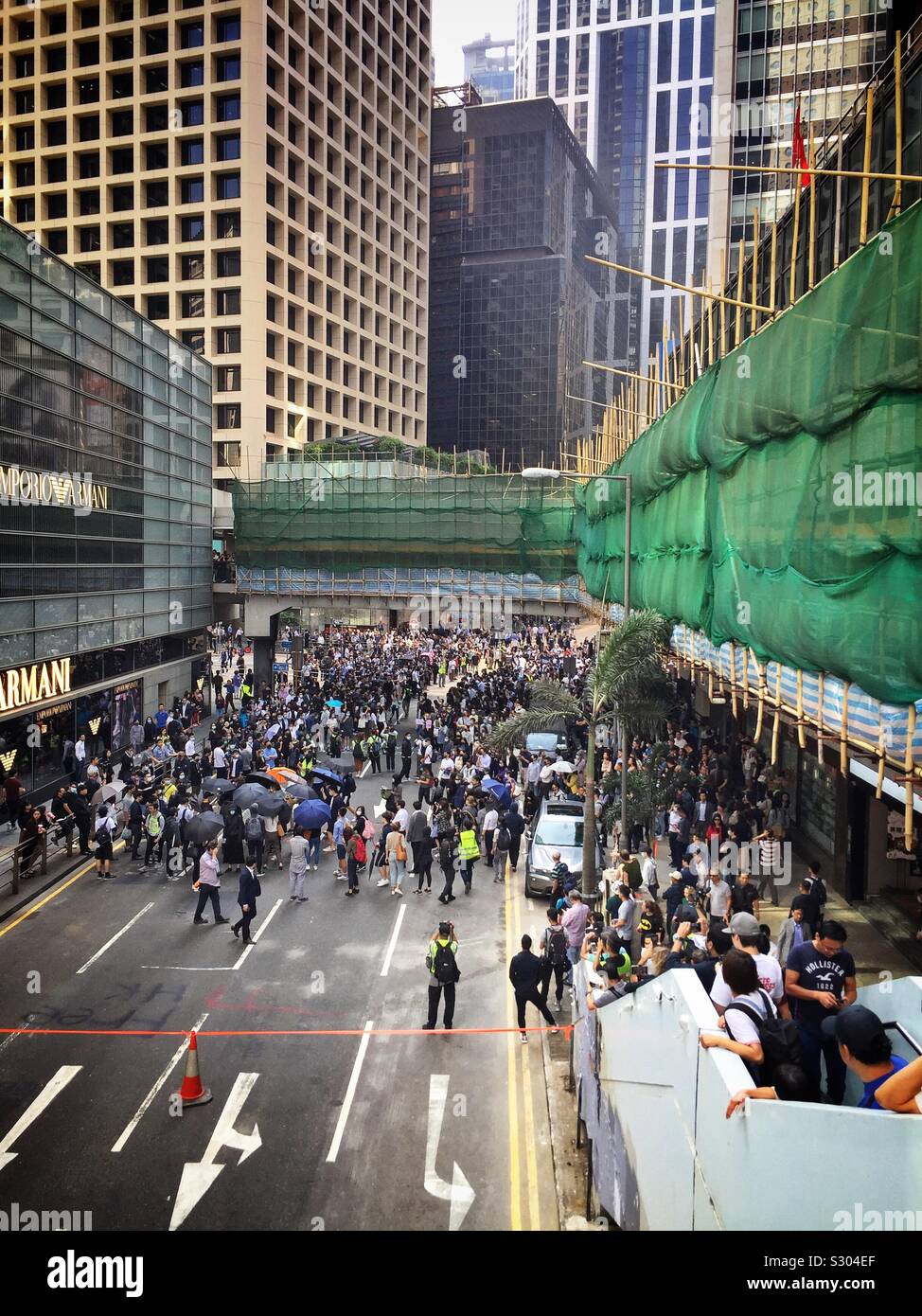 Office workers in Hong Kong’s CBD protest during their lunch break, November 2019 - Smartphone Captured Stock Image