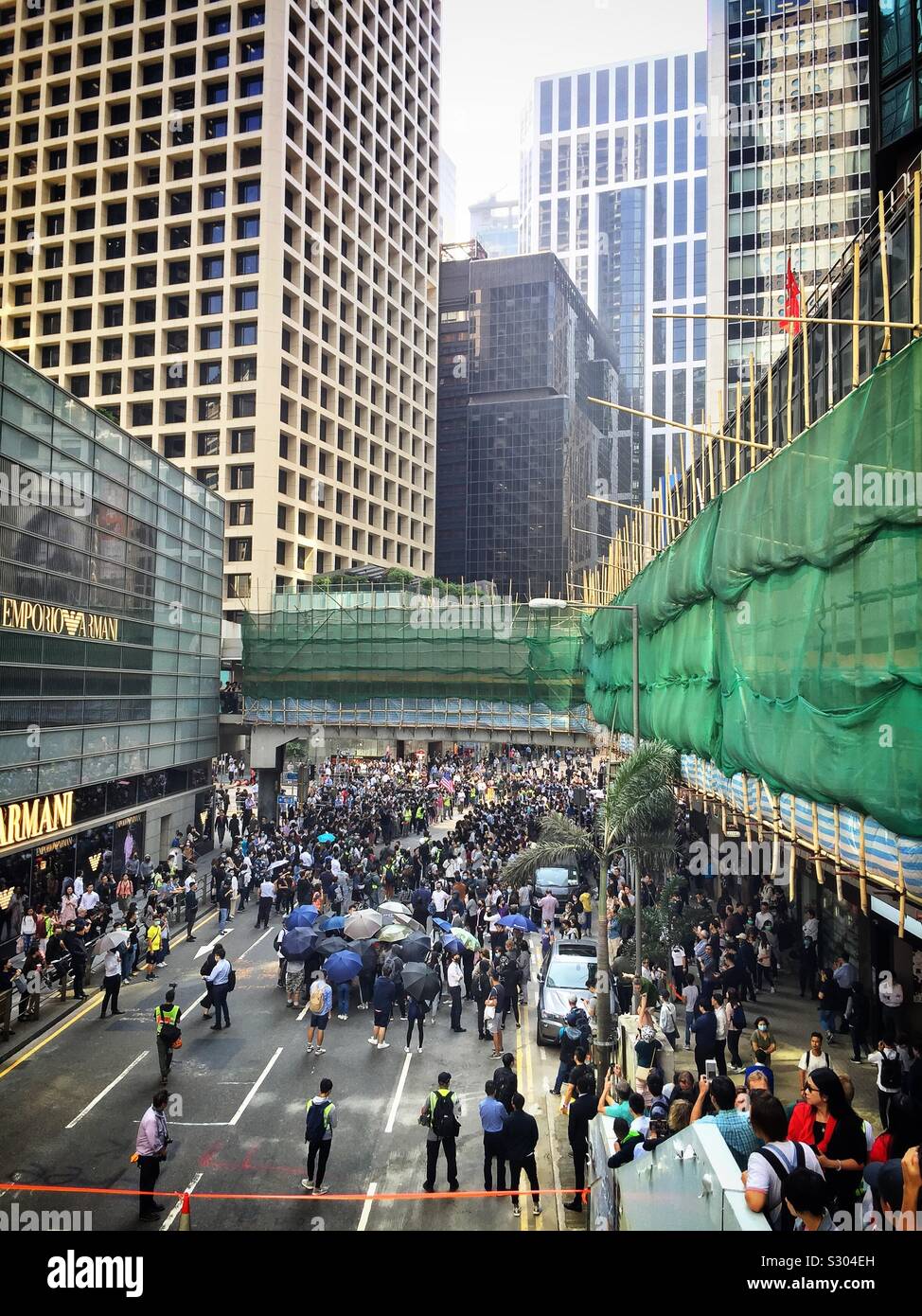 Office workers in Hong Kong’s CBD protest during their lunch break, November 2019 - Smartphone Captured Stock Image
