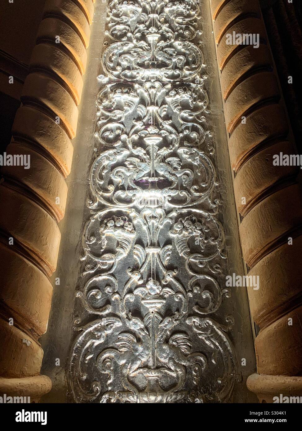 Beautiful mysterious and fancy silver wall column  in a vintage theater - Smartphone Captured Stock Image