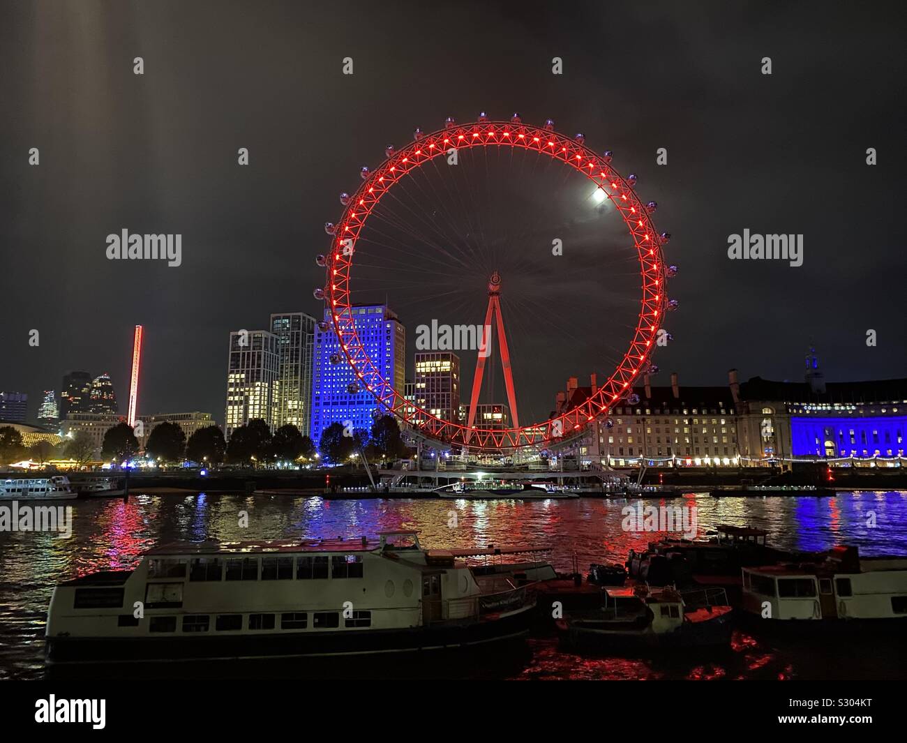 London Eye night view from the Embankment Stock Photo