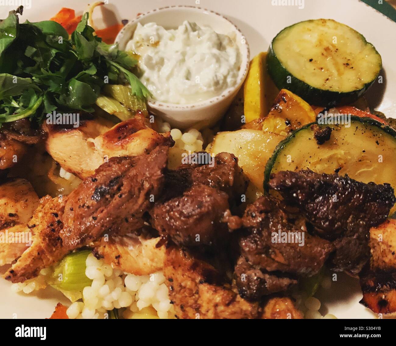 Shish kabobs at the Bierhall, Trapp Family Lodge, Stowe, Vermont, United States - Smartphone Captured Stock Image