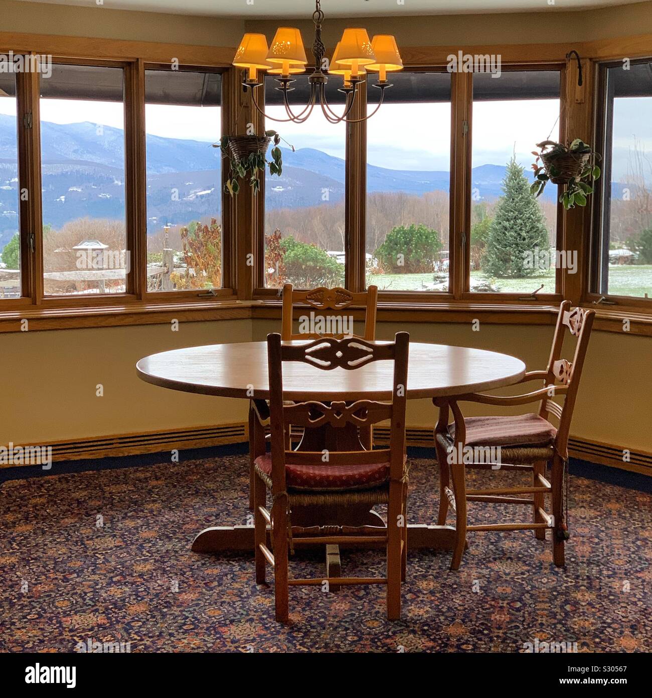 Windows provide a panoramic view of the landscape, Trapp Family Lodge, Stowe, Vermont, United States - Smartphone Captured Stock Image