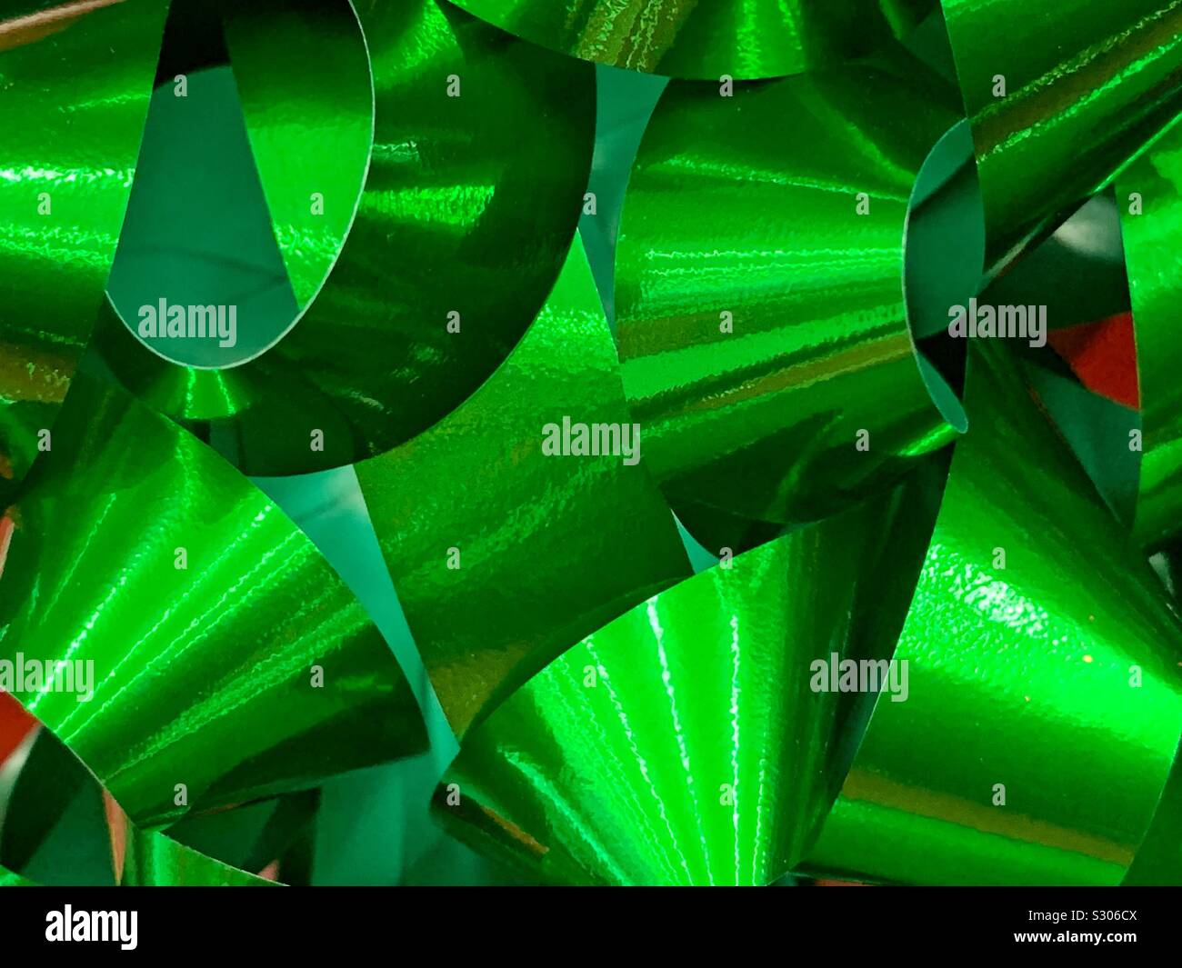Closeup macro of a green ribbon bow - Smartphone Captured Stock Image