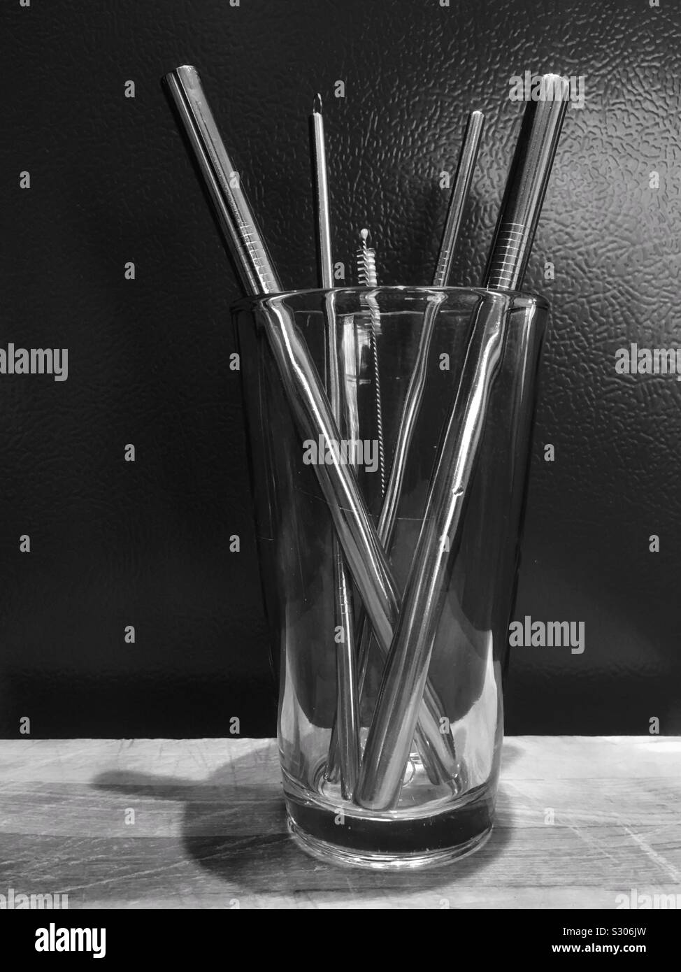 Metal straws in a glass Stock Photo