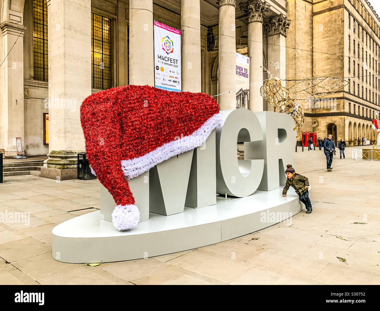 Large MCR artwork with Christmas hat in Manchester St. Peter’s square Stock Photo
