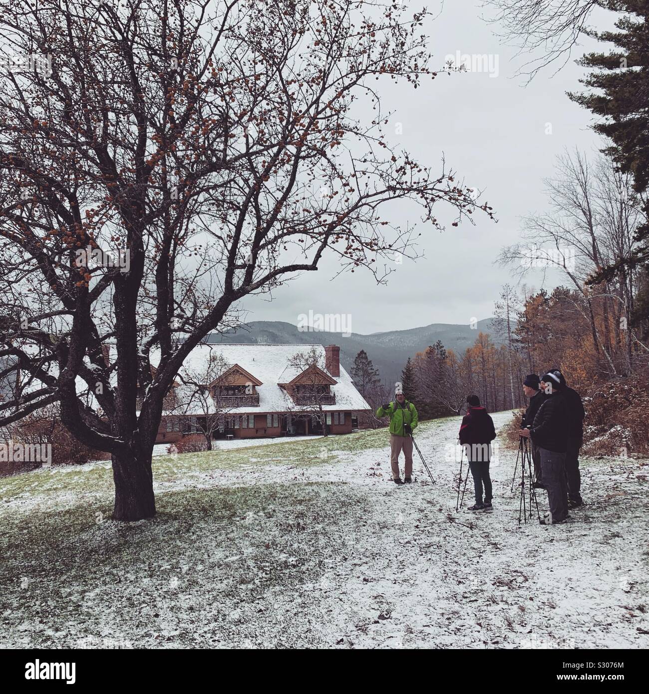 Returning to the Trapp Family Lodge at the end of a guided hike to the stone chapel on the property. Stowe, Vermont, United States - Smartphone Captured Stock Image