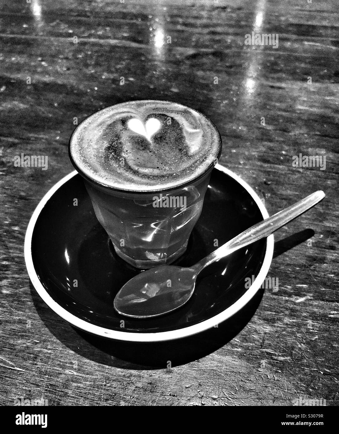 Piccolo Coffee with spoon Stock Photo Alamy