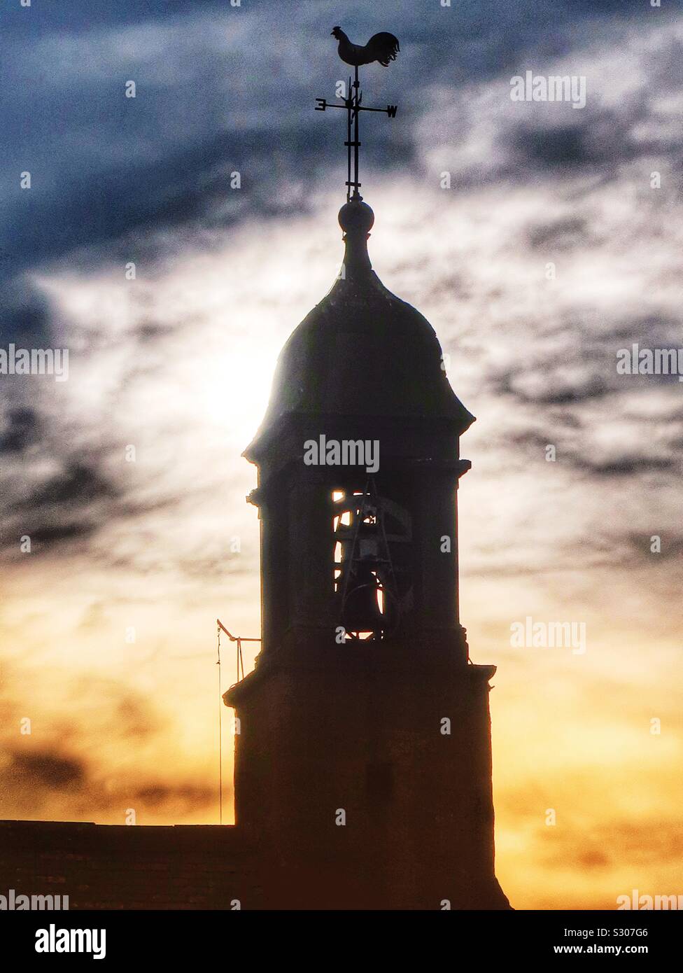 Bell tower in setting sun - Smartphone Captured Stock Image