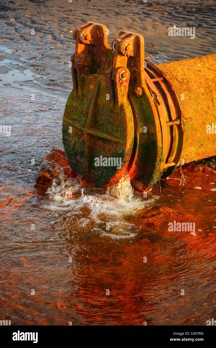 waste water from metal pipe - Smartphone Captured Stock Image