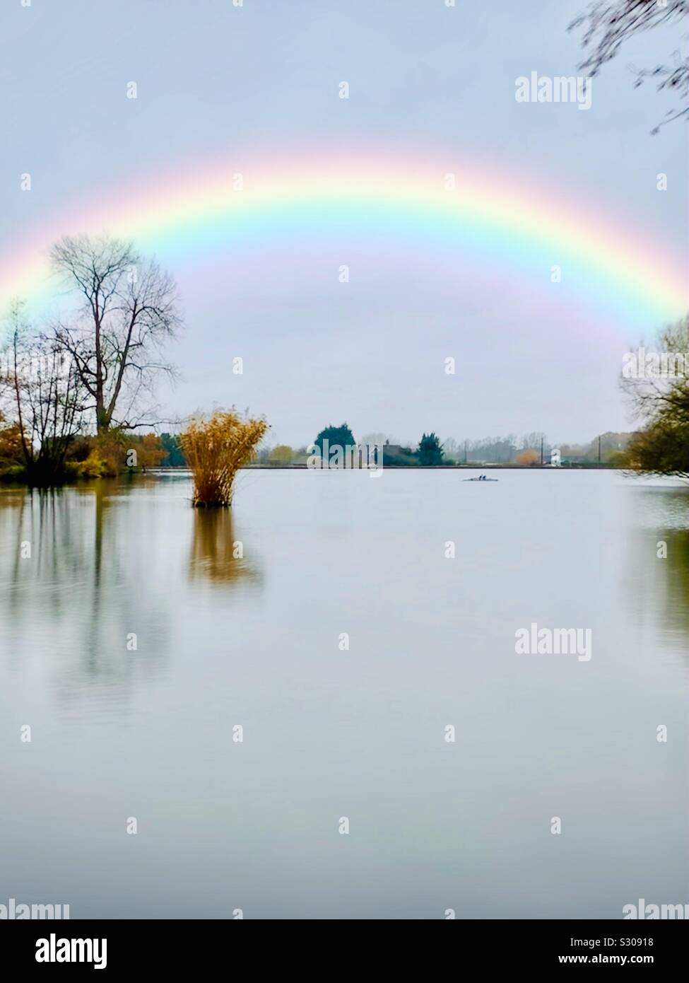 Rainbow over the lake, Reigate, Surrey, England Stock Photo - Alamy