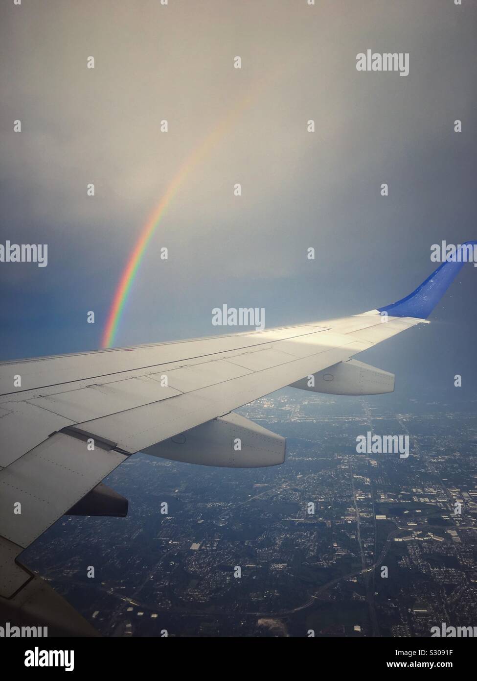 Flying Through A Rainbow Stock Photo