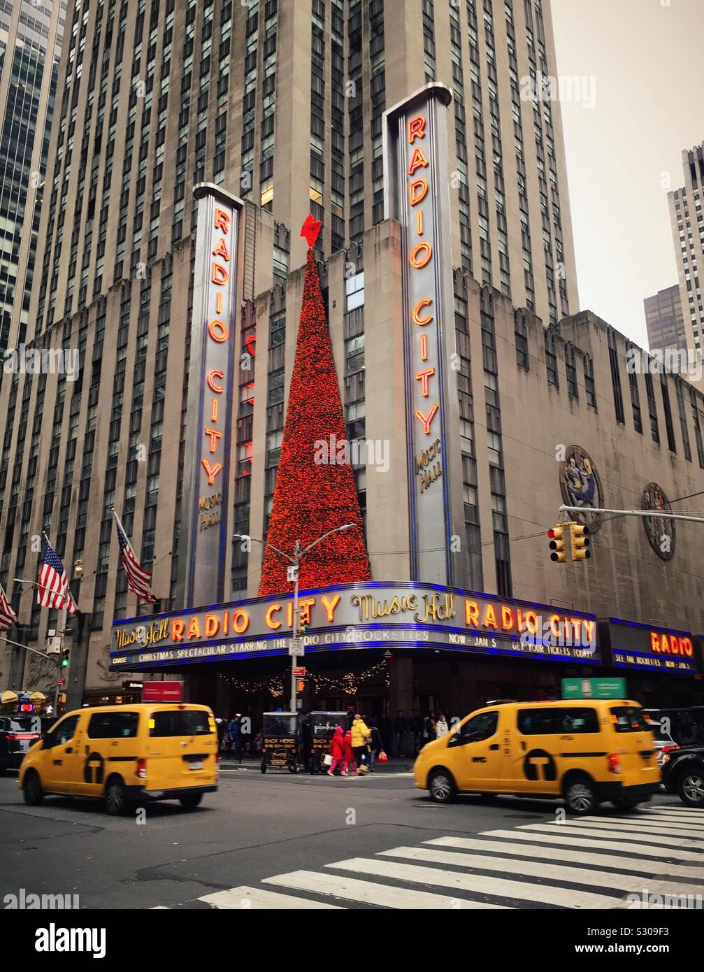 Christmas decorations on the front of radio city music Hall in Rockefeller Center on sixth Ave., NYC, USA Stock Photo