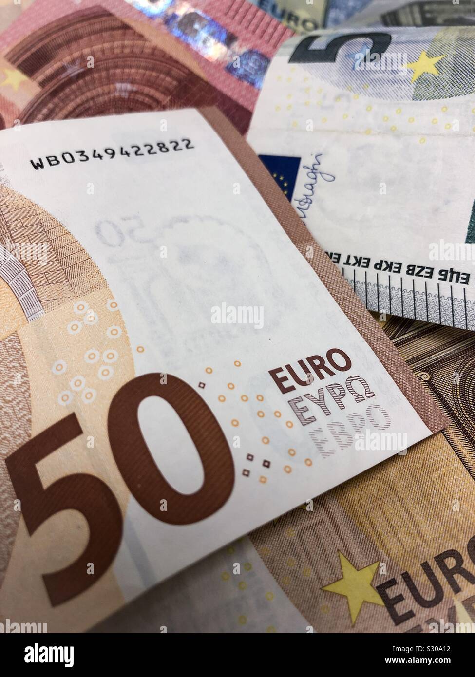 Closeup of a few Euro bank notes. Stock Photo