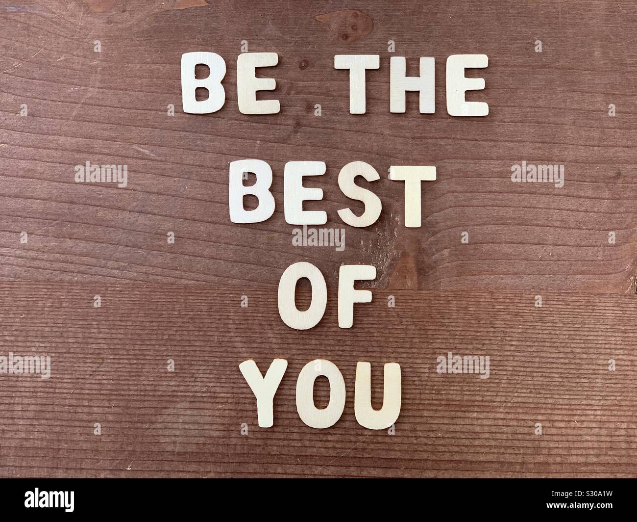 Be the best of you, motivational phrase composed with wooden letters - Smartphone Captured Stock Image
