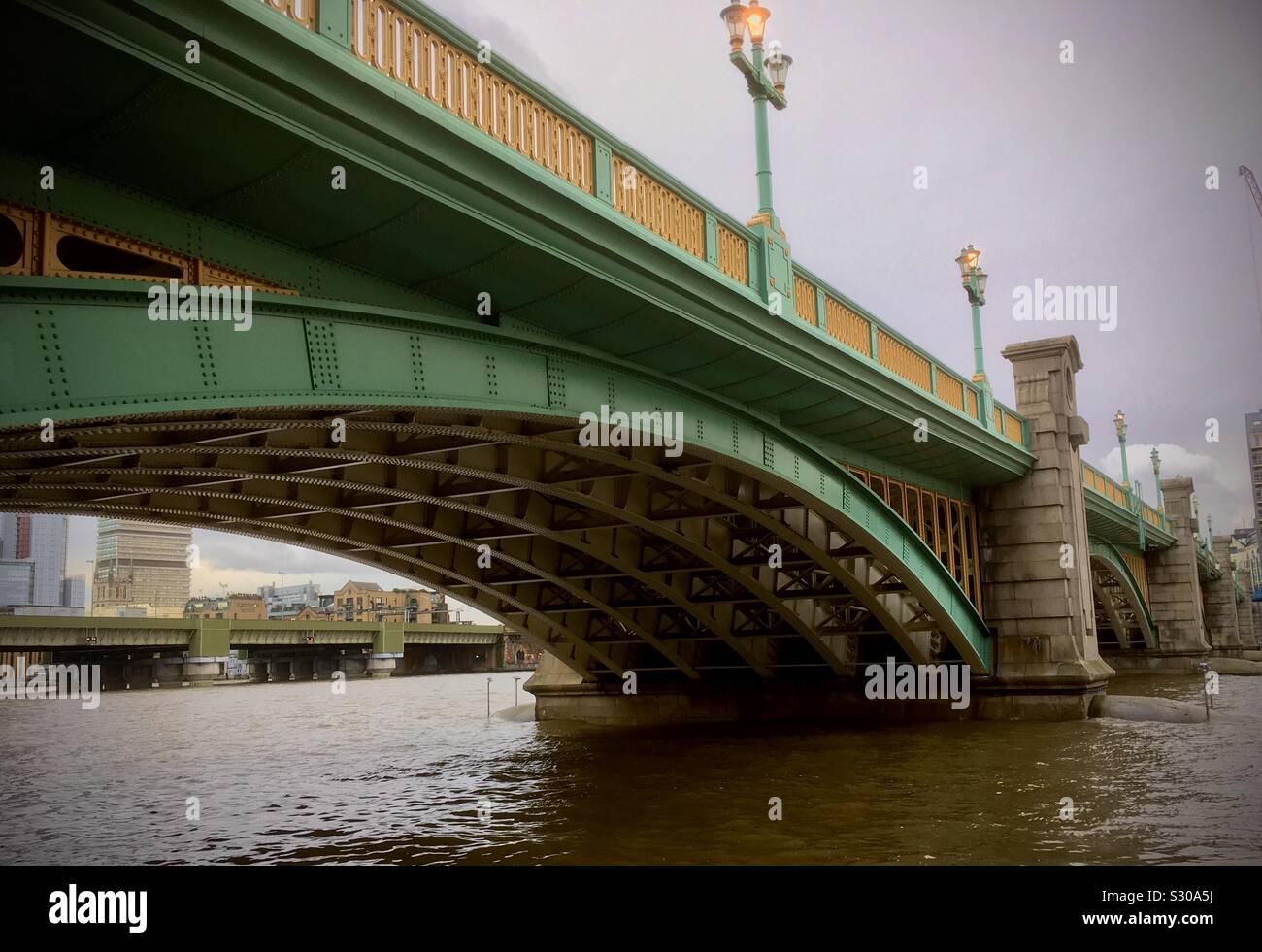 View of Cannon Street bridge taken from the river Thames footpath - Smartphone Captured Stock Image