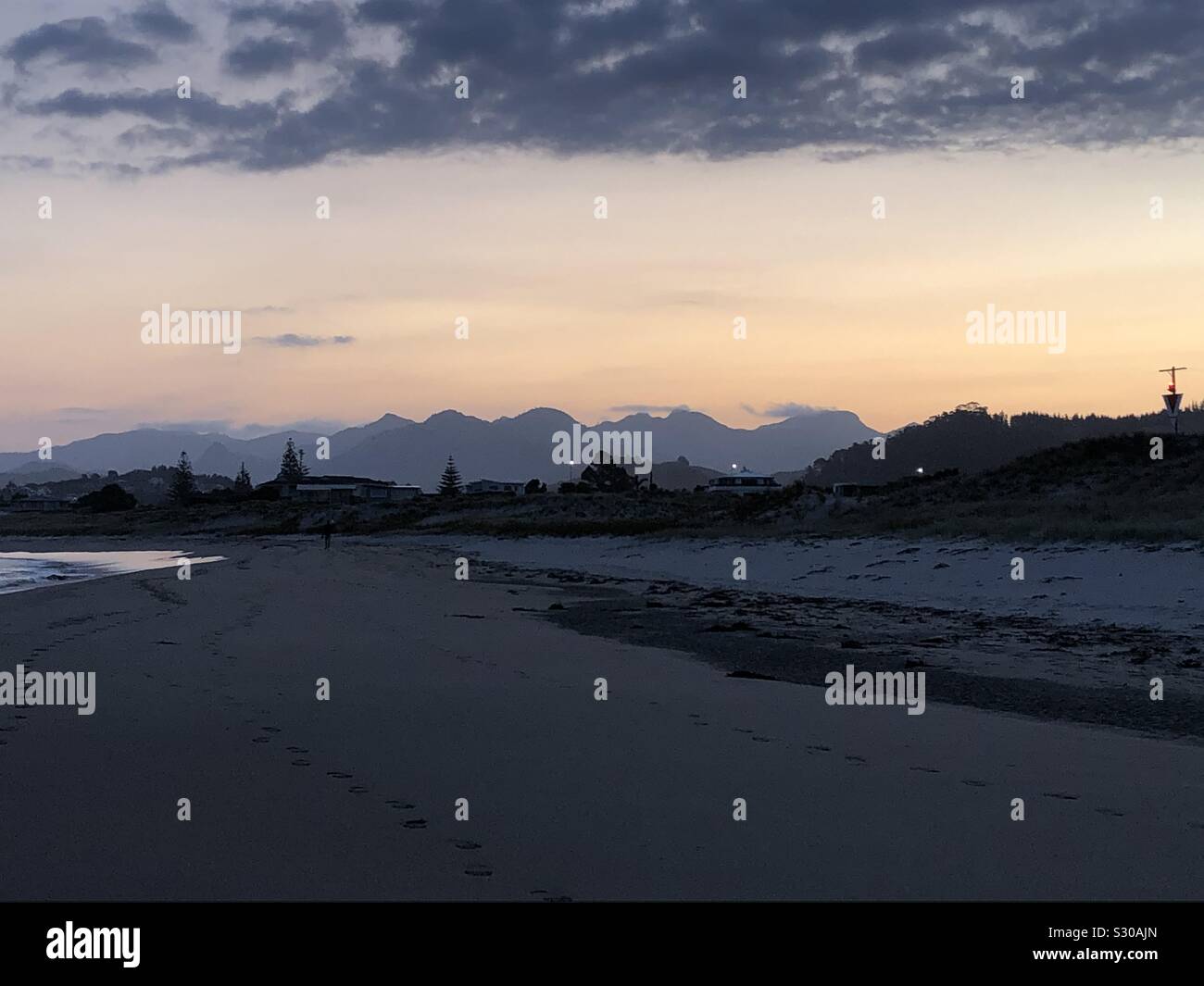 Sunset over Whangamata; on the North Island of New Zealand - Smartphone Captured Stock Image