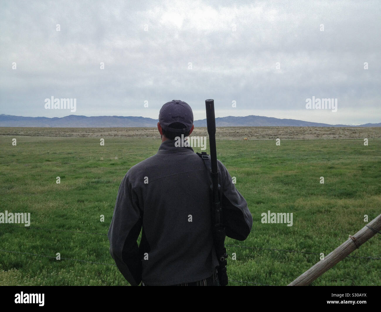 Man with air gun and silencer, Boise, Idaho, USA. 2013. Stock Photo