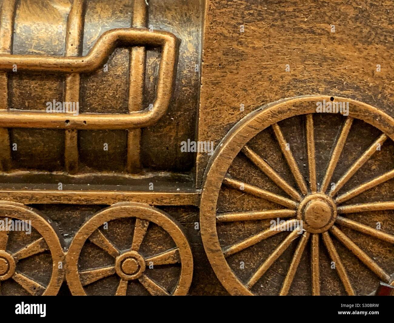 Full frame of a golden metallic train engine - Smartphone Captured Stock Image