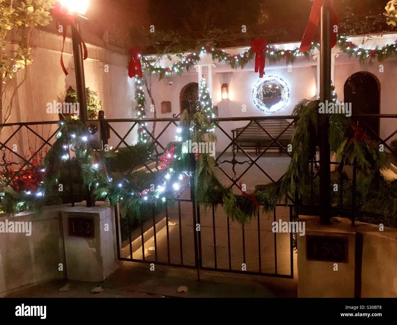 An historic Row House in Murray Hill is decorated for the holiday season, NYC, USA - Smartphone Captured Stock Image