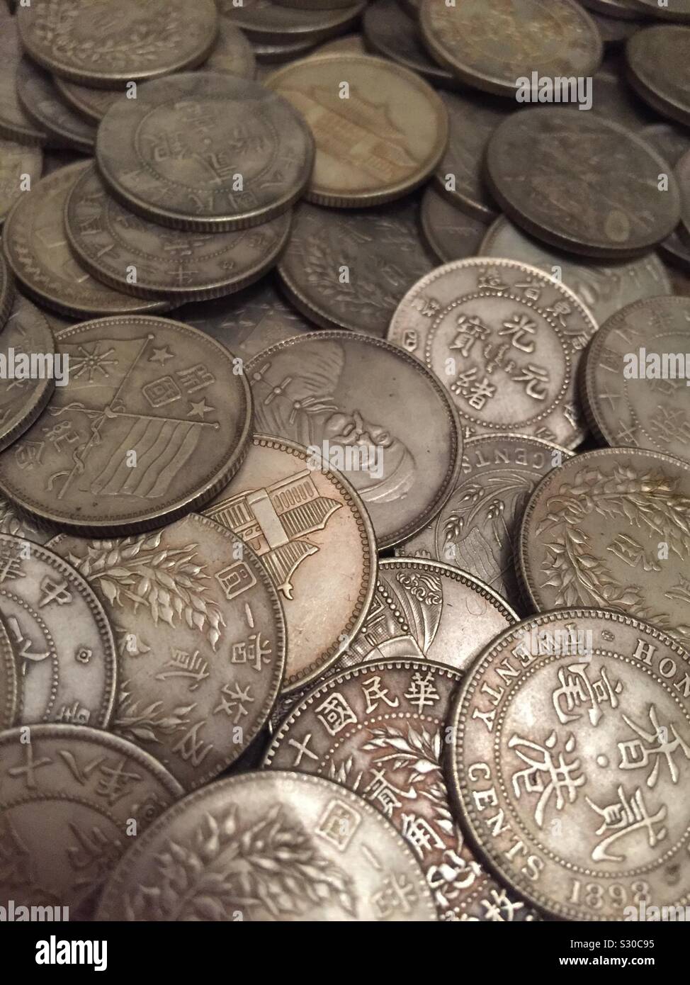 Old chinese coins hi-res stock photography and images - Alamy
