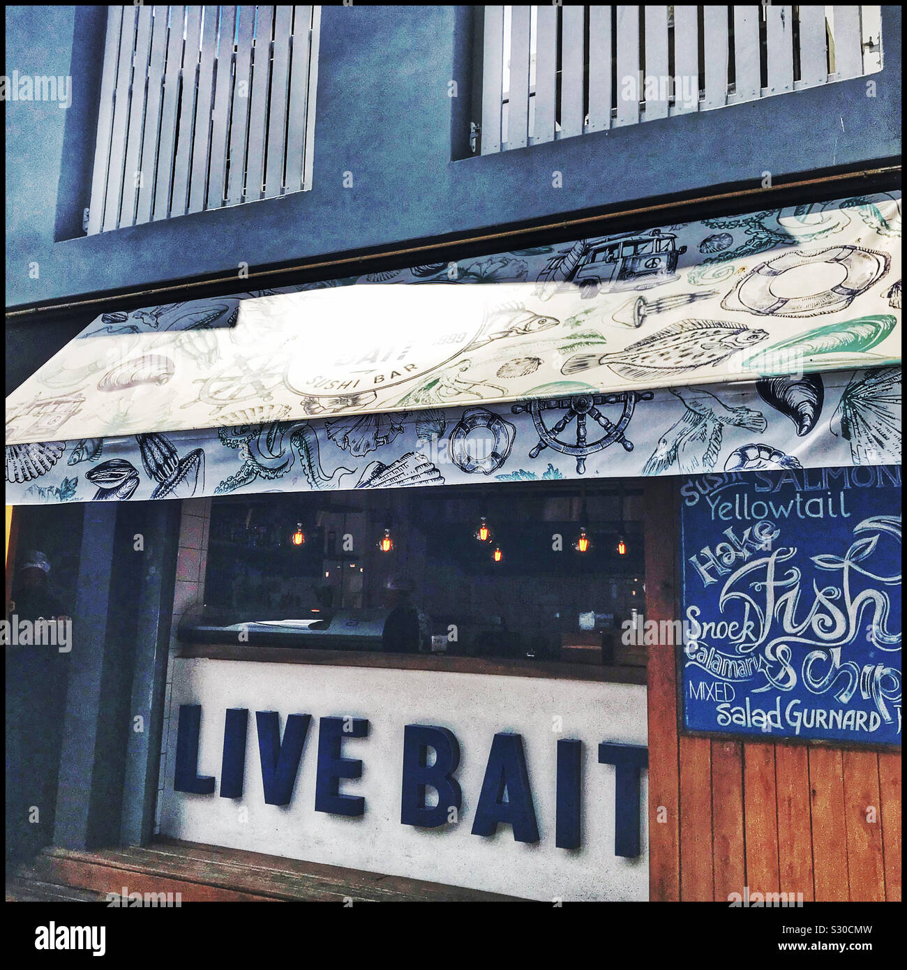 Live Bait restaurant, V&A Waterfront, Cape Town, South Africa. Heavy use of filters. - Smartphone Captured Stock Image
