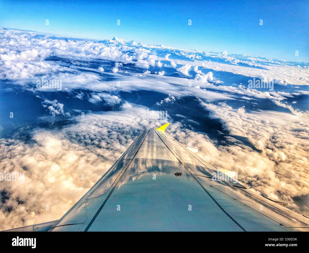 Flying over the clouds. Stock Photo