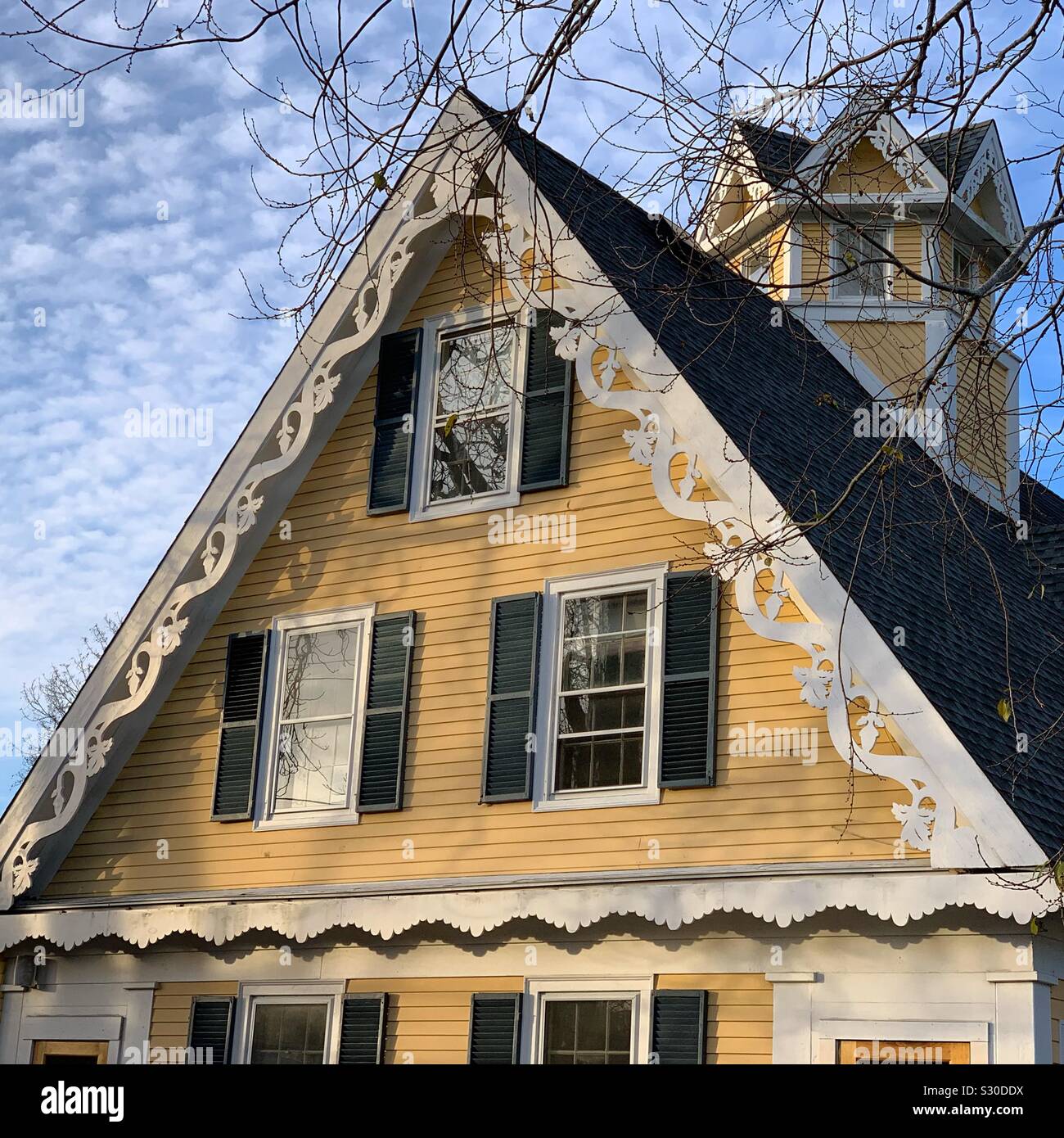 Detail, The Optimist Cafe, Yarmouth Port, Cape Cod, Massachusetts, United States. The Cafe is housed in the Captain Howes House, built for a sea captain in the Gothic Revival style in 1849. - Smartphone Captured Stock Image Detail, The Optimist Cafe, Yarmouth Port, Cape Cod, Massachusetts, United States. The Cafe is housed in the Captain Howes House, built for a sea captain in the Gothic Revival style in 1849. - Smartphone Captured Stock Image