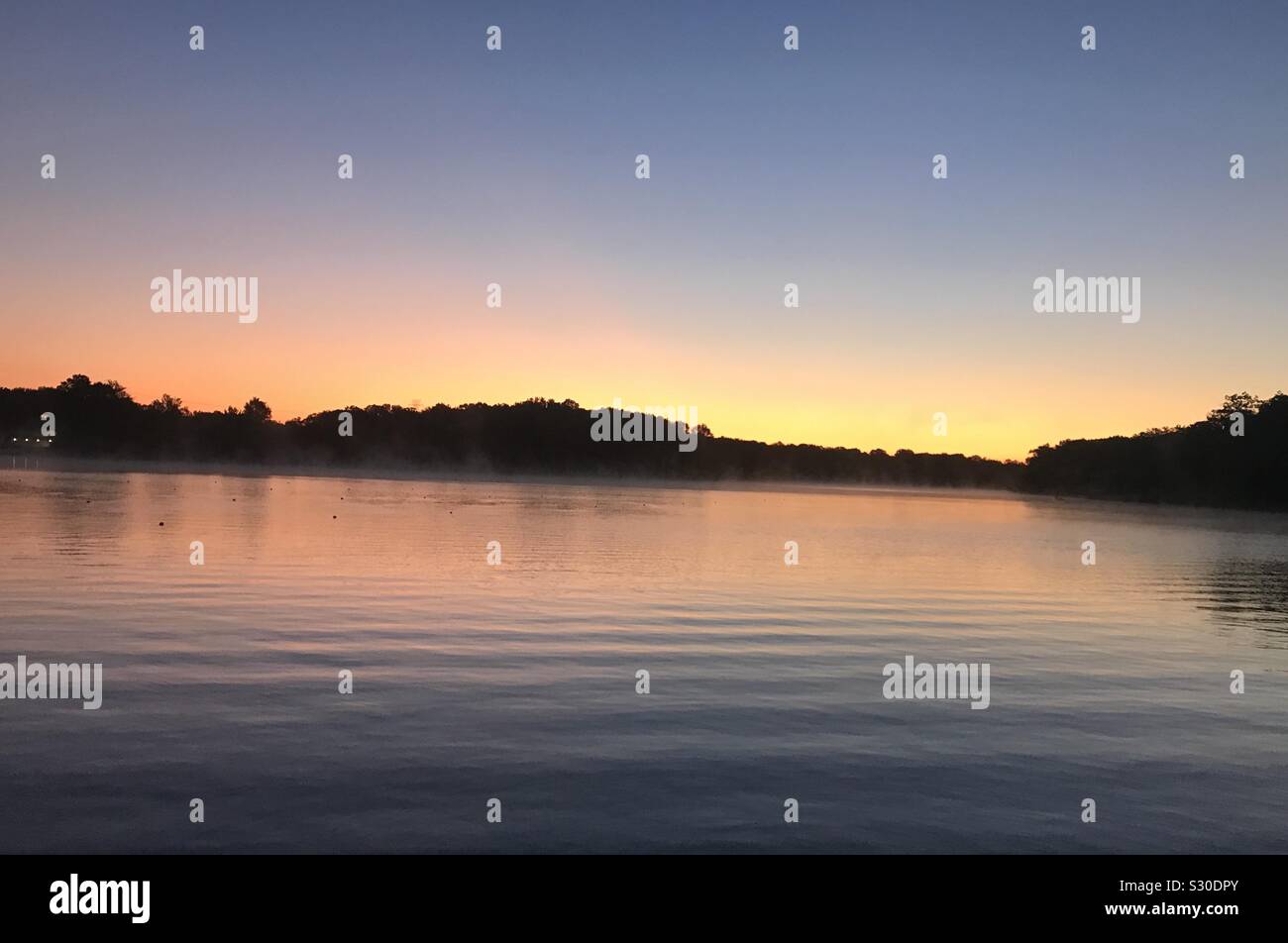 Beautiful sunrise over the Lake at Mercer County Park in Hamilton - Smartphone Captured Stock Image