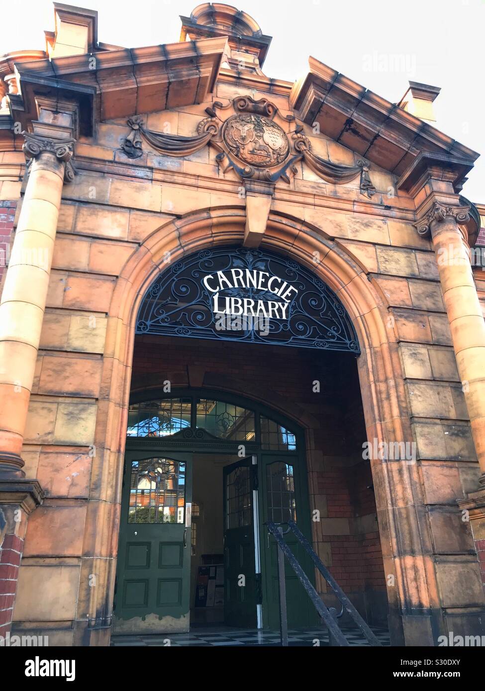 The elegant Edwardian architecture of the entrance to Carnegie Public Library, Herne Hill