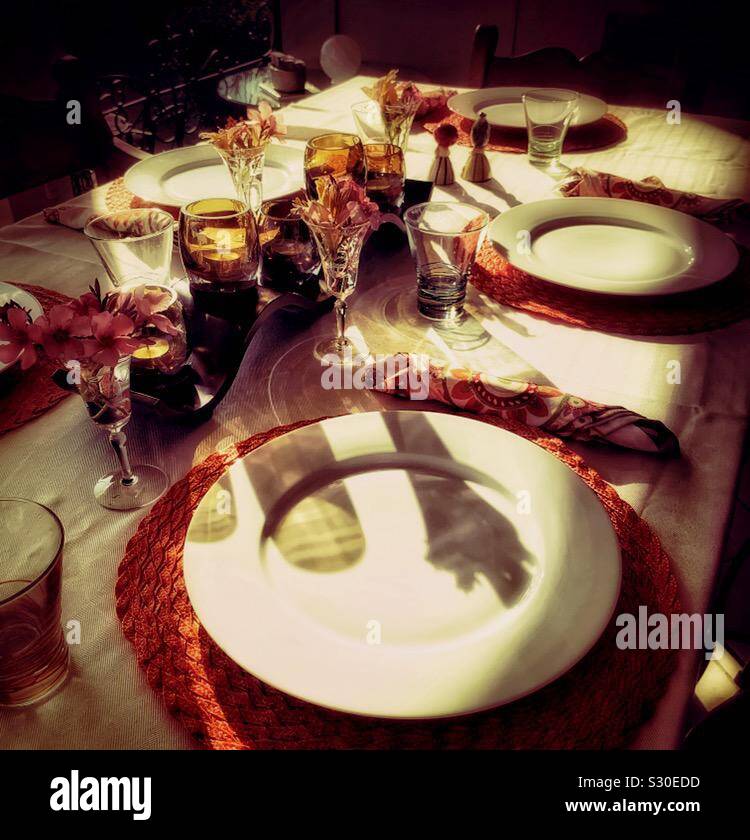 A table is set for an alfresco Thanksgiving meal celebration. Stock Photo