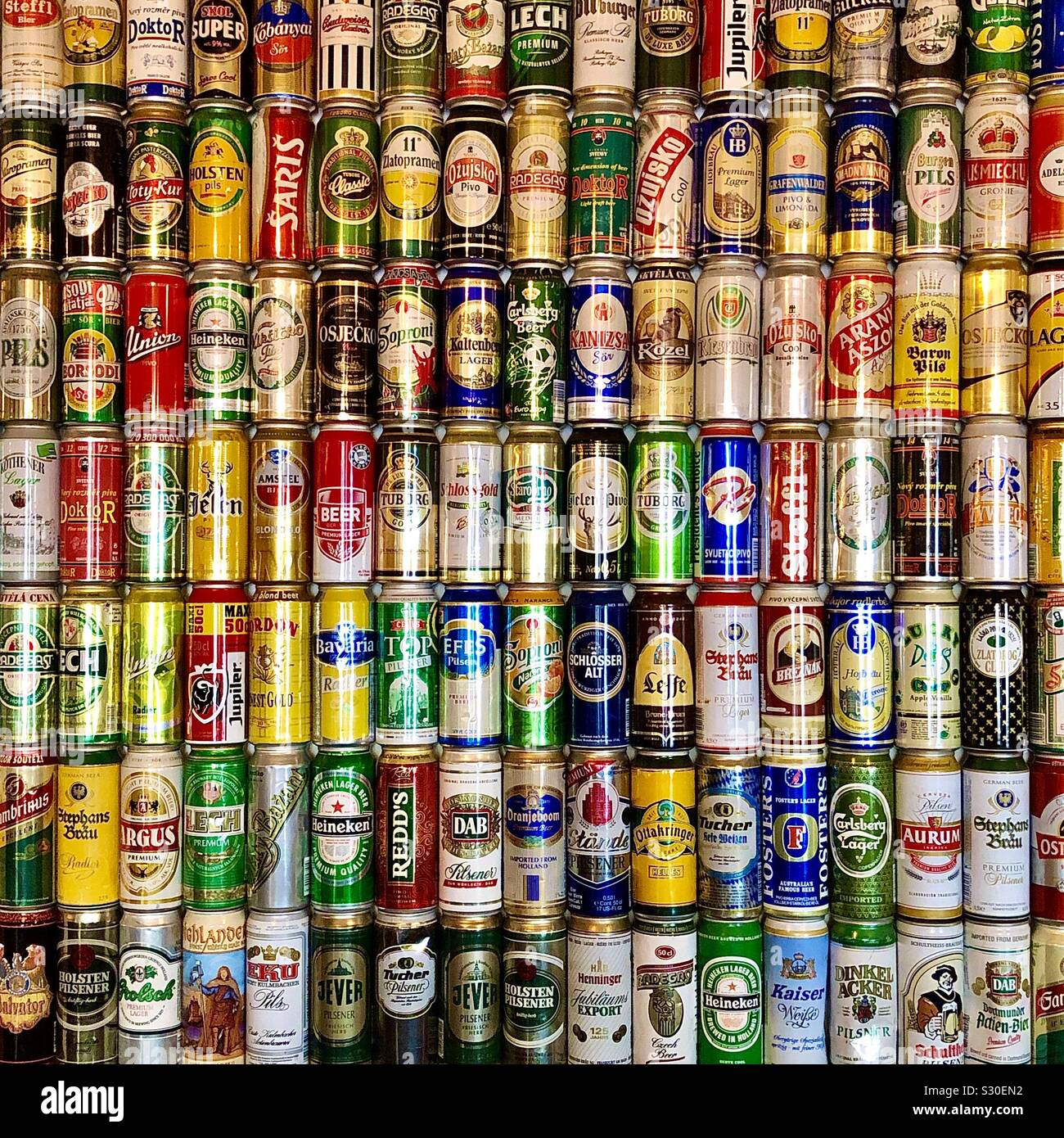 Wall of beer cans in bar, Vienna, Austria. Stock Photo