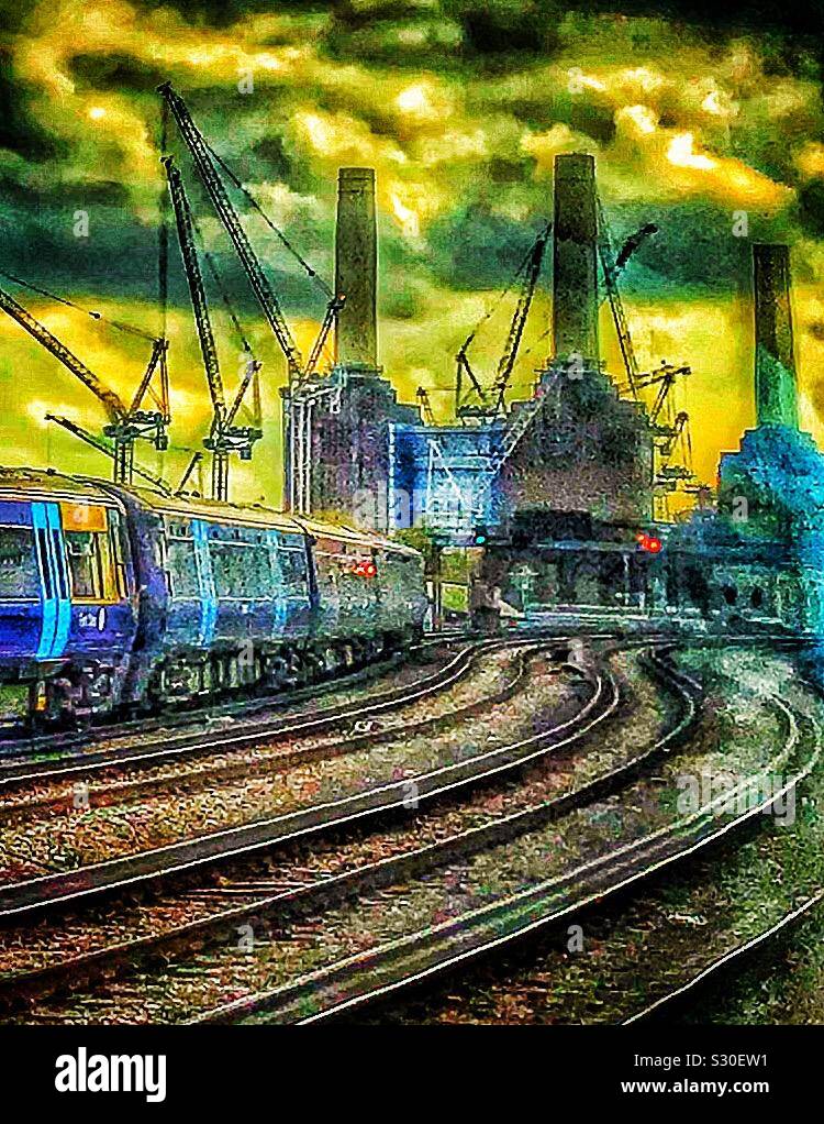 Battersea bend. Battersea Power Station under reconstruction and redevelopment, London viewed from the railway tracks of Victoria Station - Smartphone Captured Stock Image