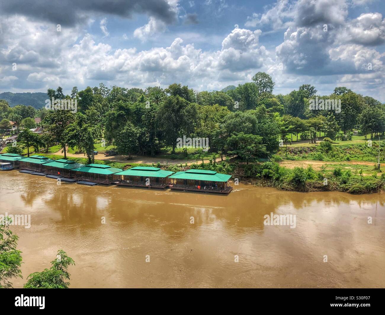 Community on the river in Thailand. - Smartphone Captured Stock Image