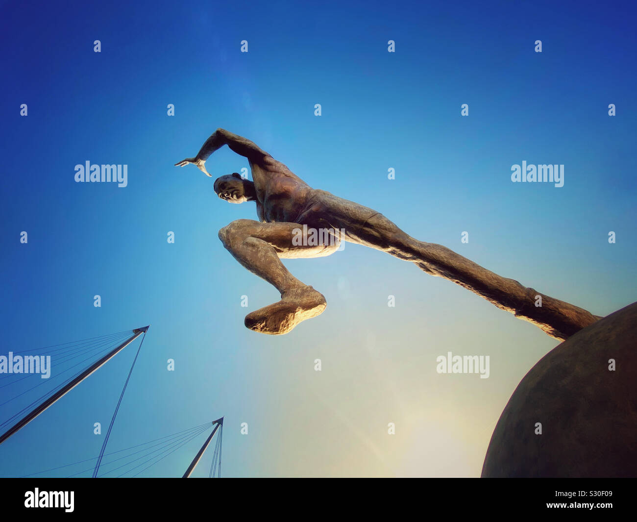 The Runner statue at Sportcity in Manchester (bronze sculpture by Colin Spofforth) - Smartphone Captured Stock Image