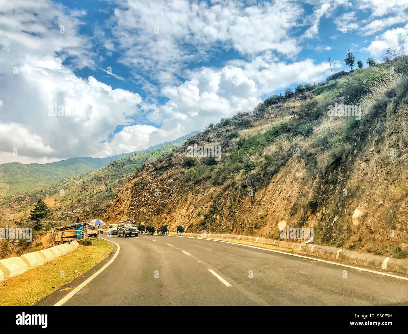 On the road in Bhutan. - Smartphone Captured Stock Image