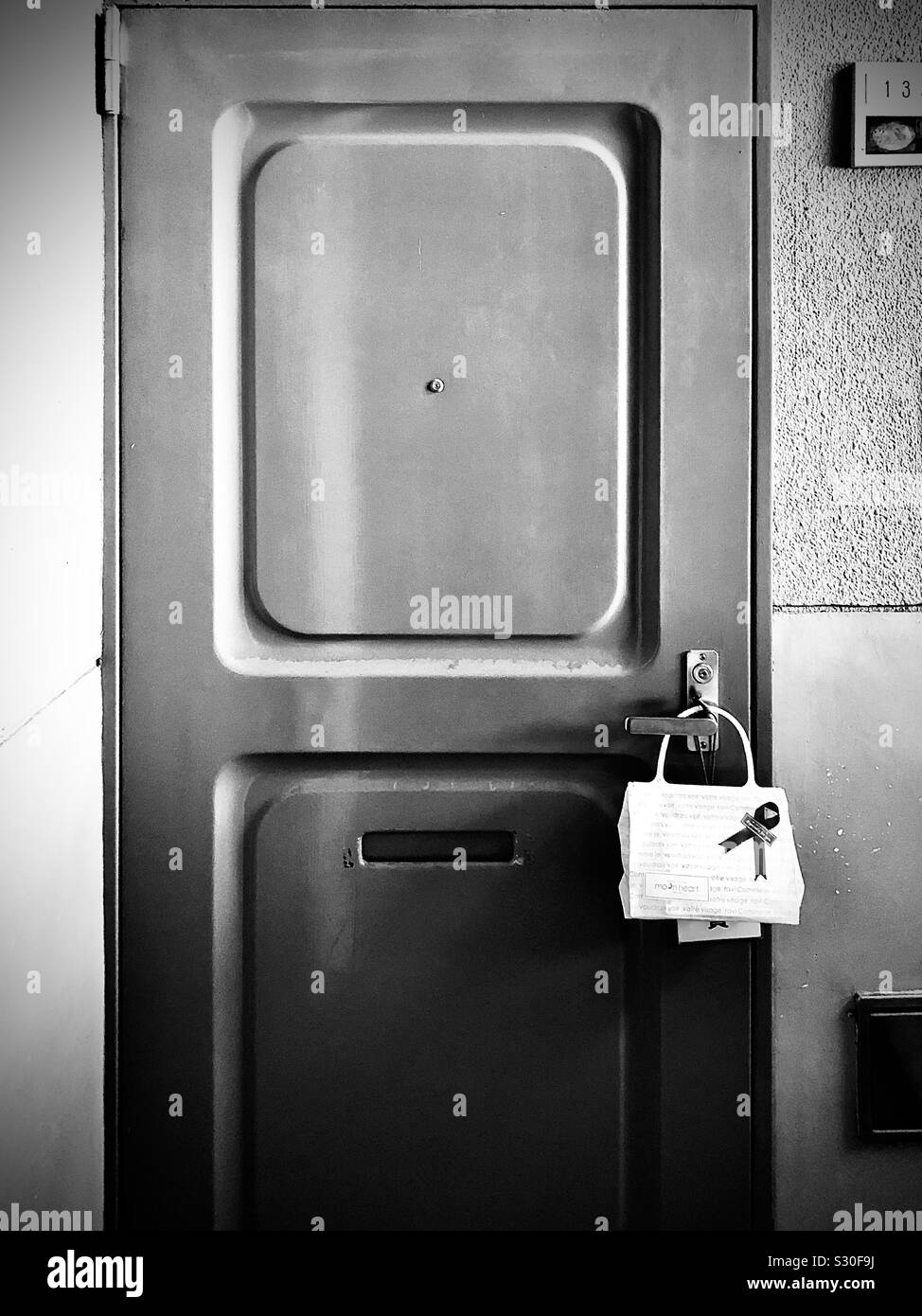 A present hanging from a doorknob - Smartphone Captured Stock Image