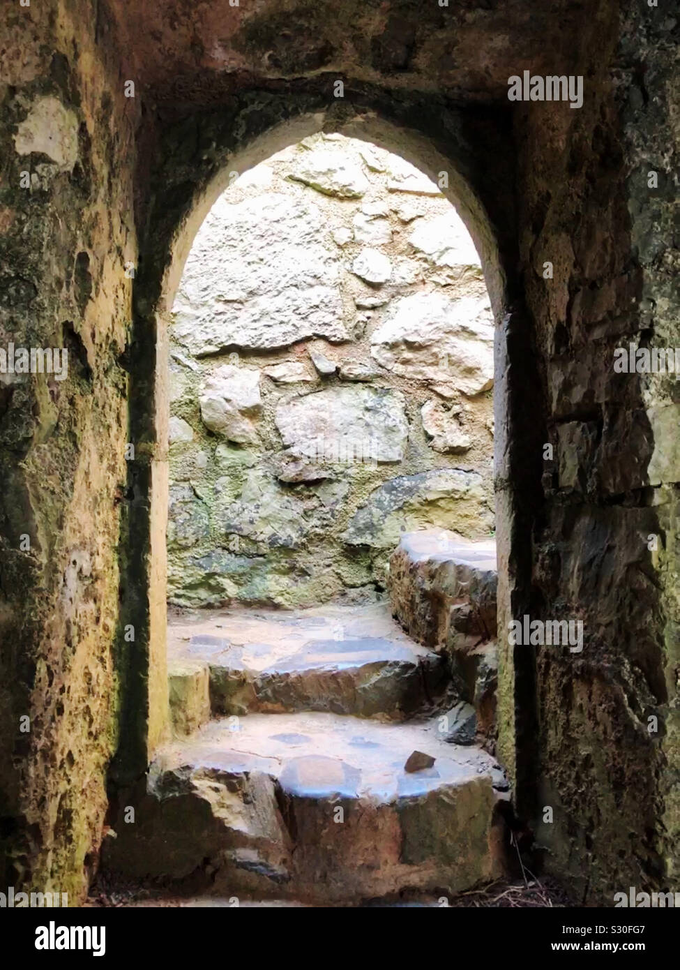 Doorway at St Govan’s Chapel, Bosherston in the Pembrokeshire Coast National Park. Stock Photo