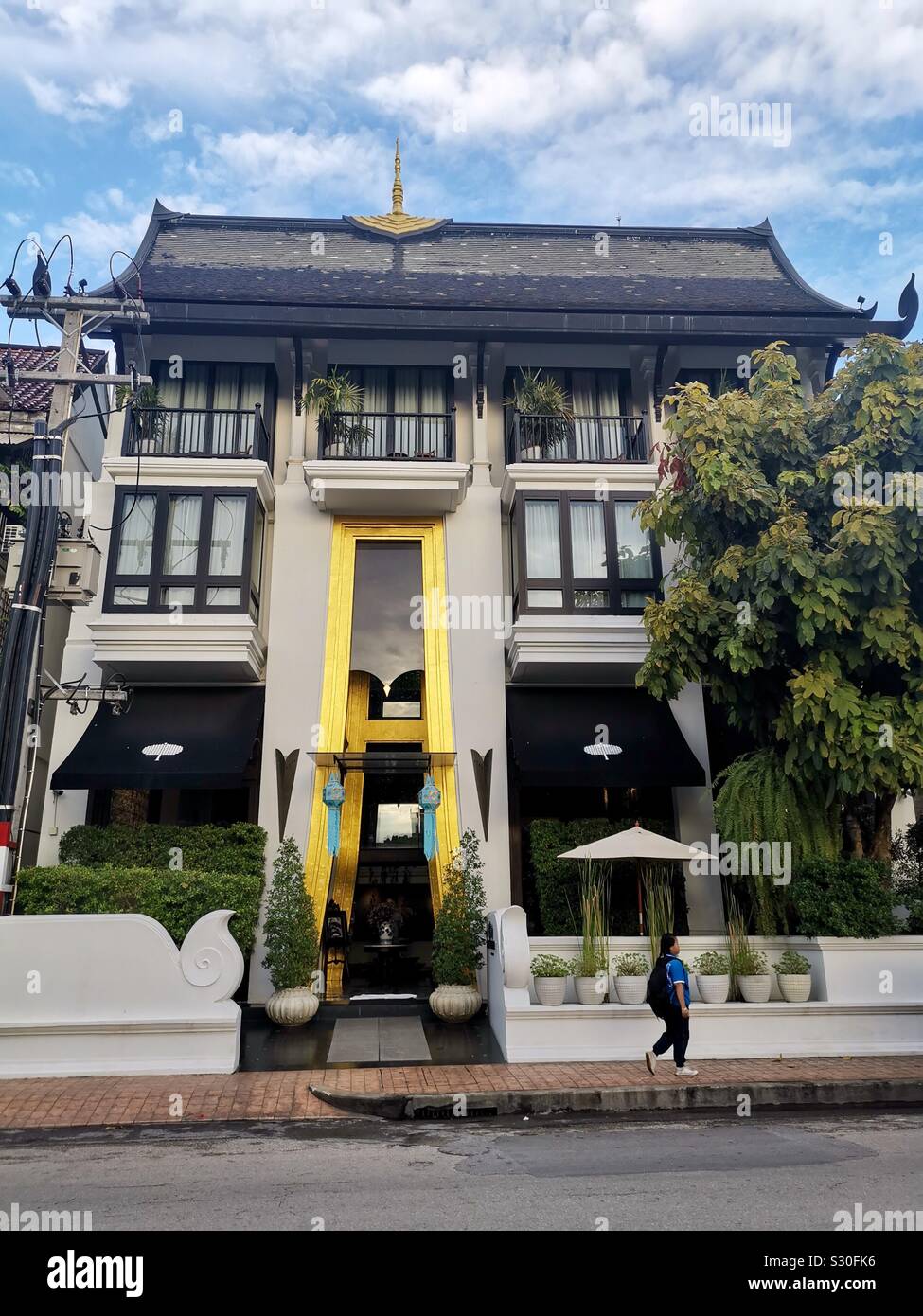 A new building designed with traditional Thai architectural elements. - Smartphone Captured Stock Image