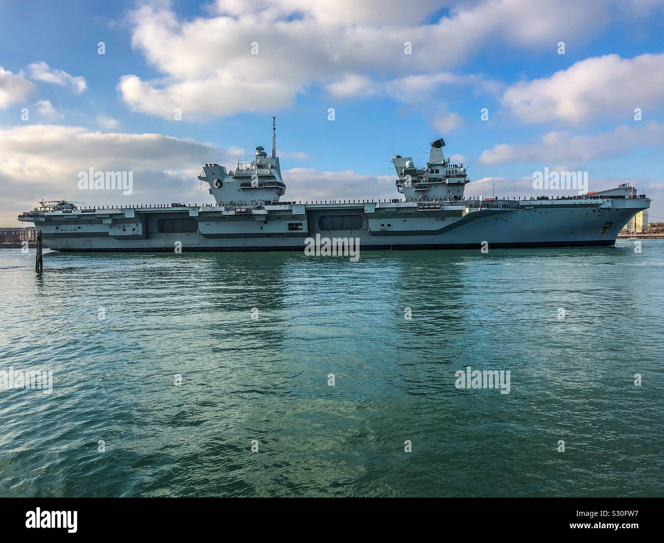 Royal Navy Aircraft Carrier HMS Queen Elizabeth arriving at her home port of Portsmouth on December 4 2019 - Smartphone Captured Stock Image