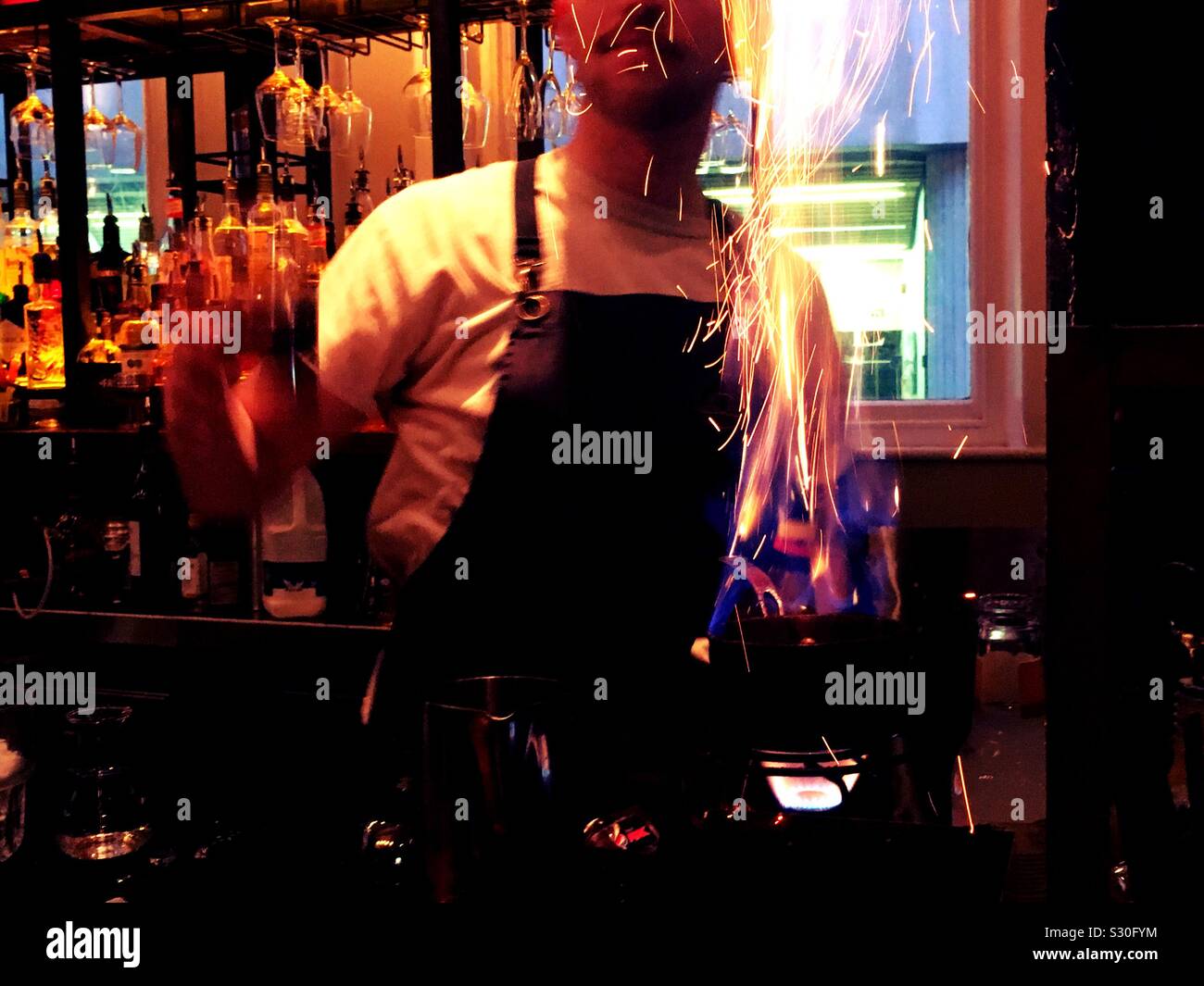 The alchemist cocktail bar - Smartphone Captured Stock Image