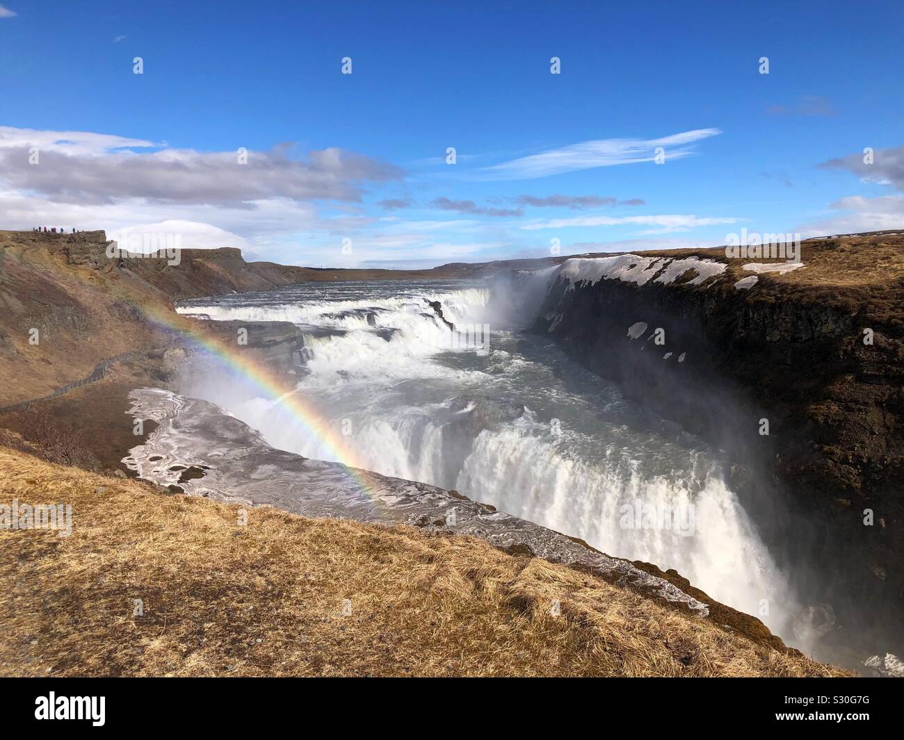 Rainbow at the Gullfoss waterfall located in the canyon of the Hvítá river in southwest Iceland - Smartphone Captured Stock Image