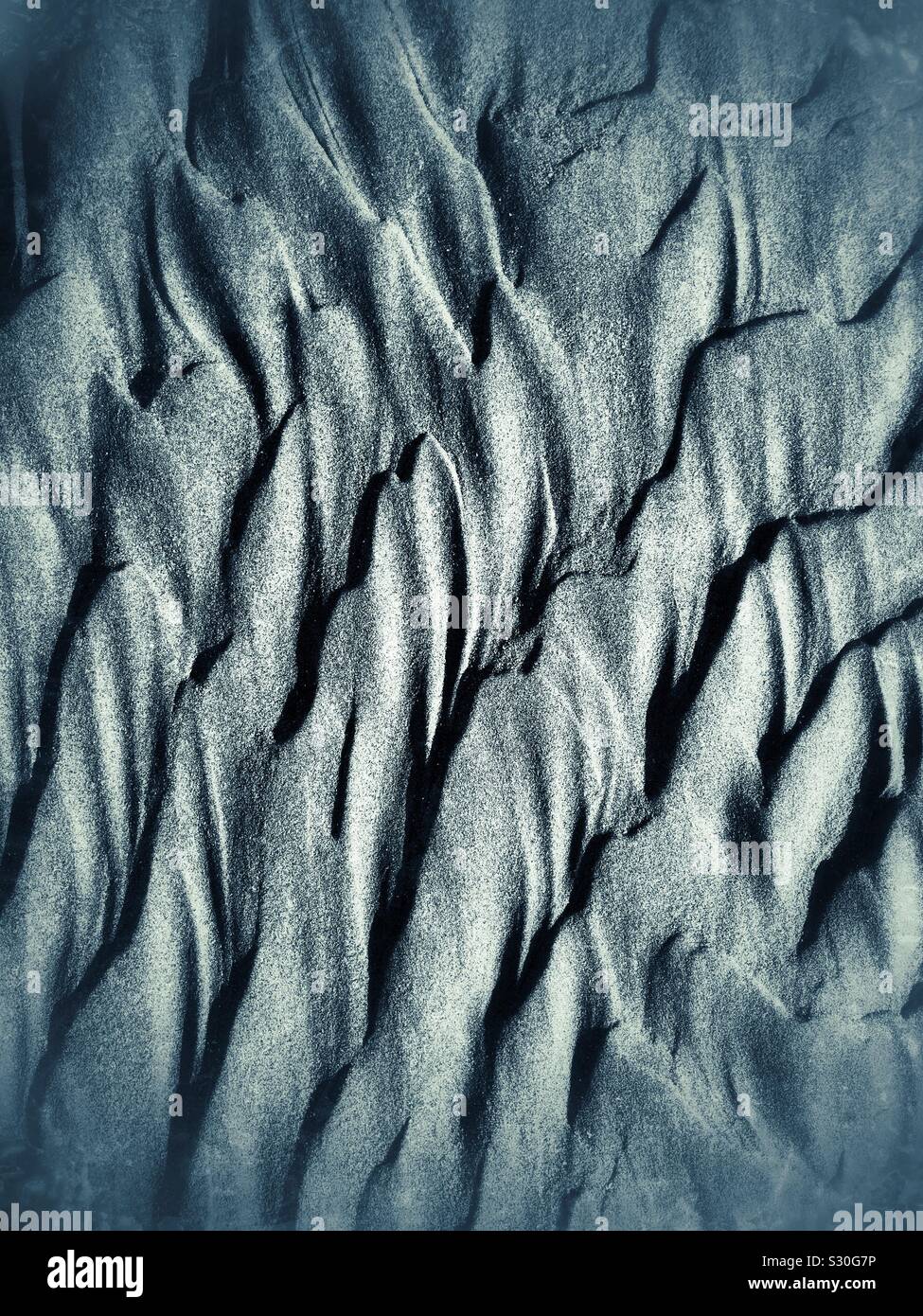 Waves patterns on sand in Tofino, BC Stock Photo