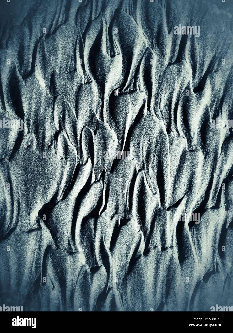 Waves patterns on sand in Tofino, BC - Smartphone Captured Stock Image