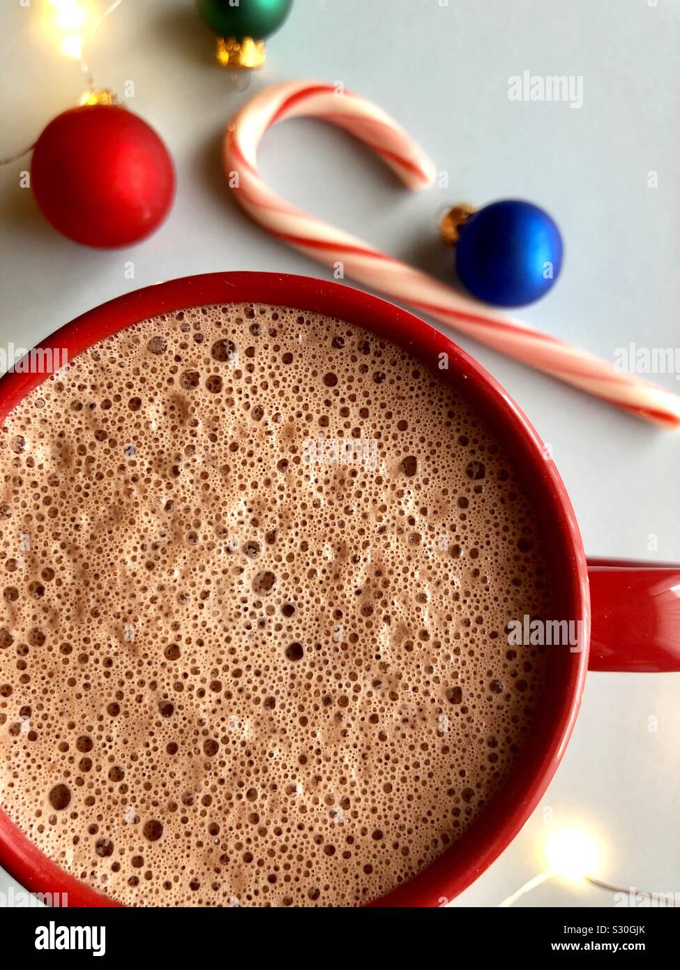 Hot cocoa in a red mug - Smartphone Captured Stock Image
