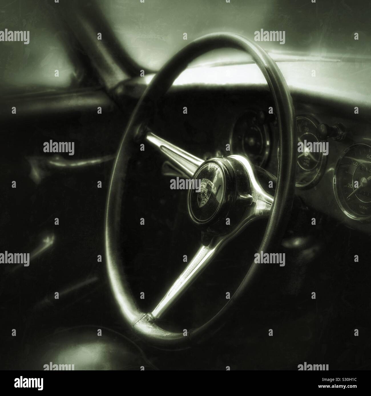 Vintage Porsche steering wheel and dashboard - Smartphone Captured Stock Image