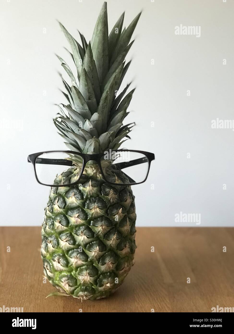 Pineapple wearing glasses Stock Photo Alamy