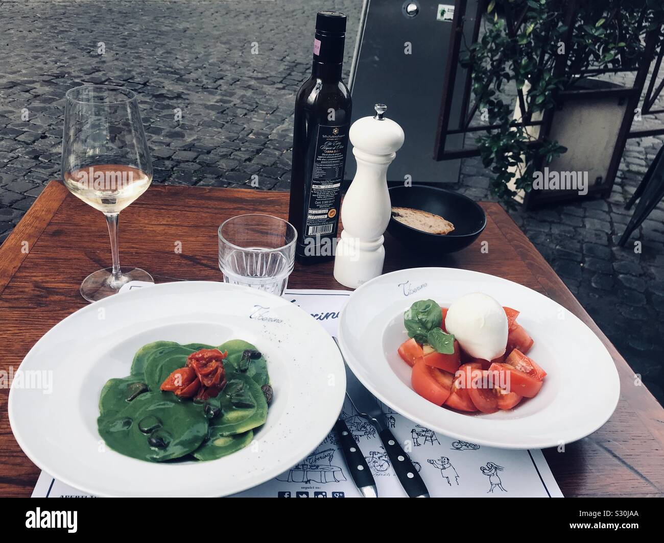 Rome, Italy. Pasta at the cafe. Pesto and Caprese Stock Photo Alamy