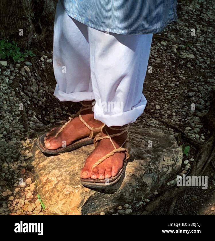 Old-fashioned sandals made from henequen fibers are worn by an elderly man at the Sotuta de Péon Hacienda in the Yucatán. Stock Photo
