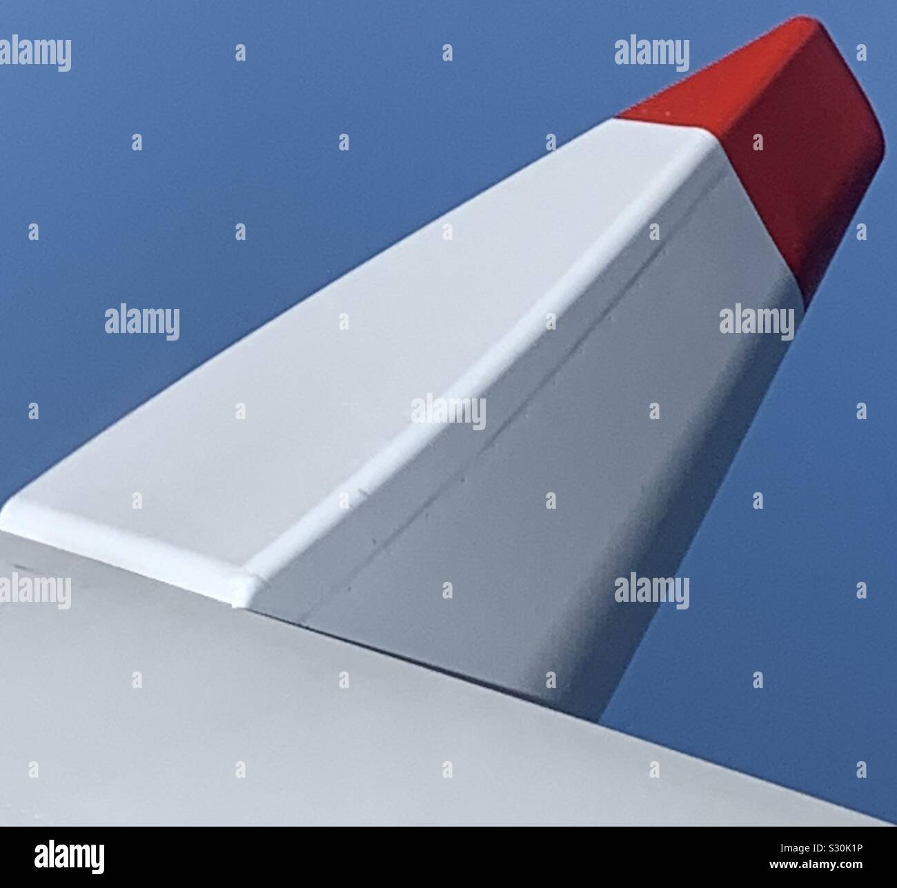 Part of wing of airplane against the sky. - Smartphone Captured Stock Image