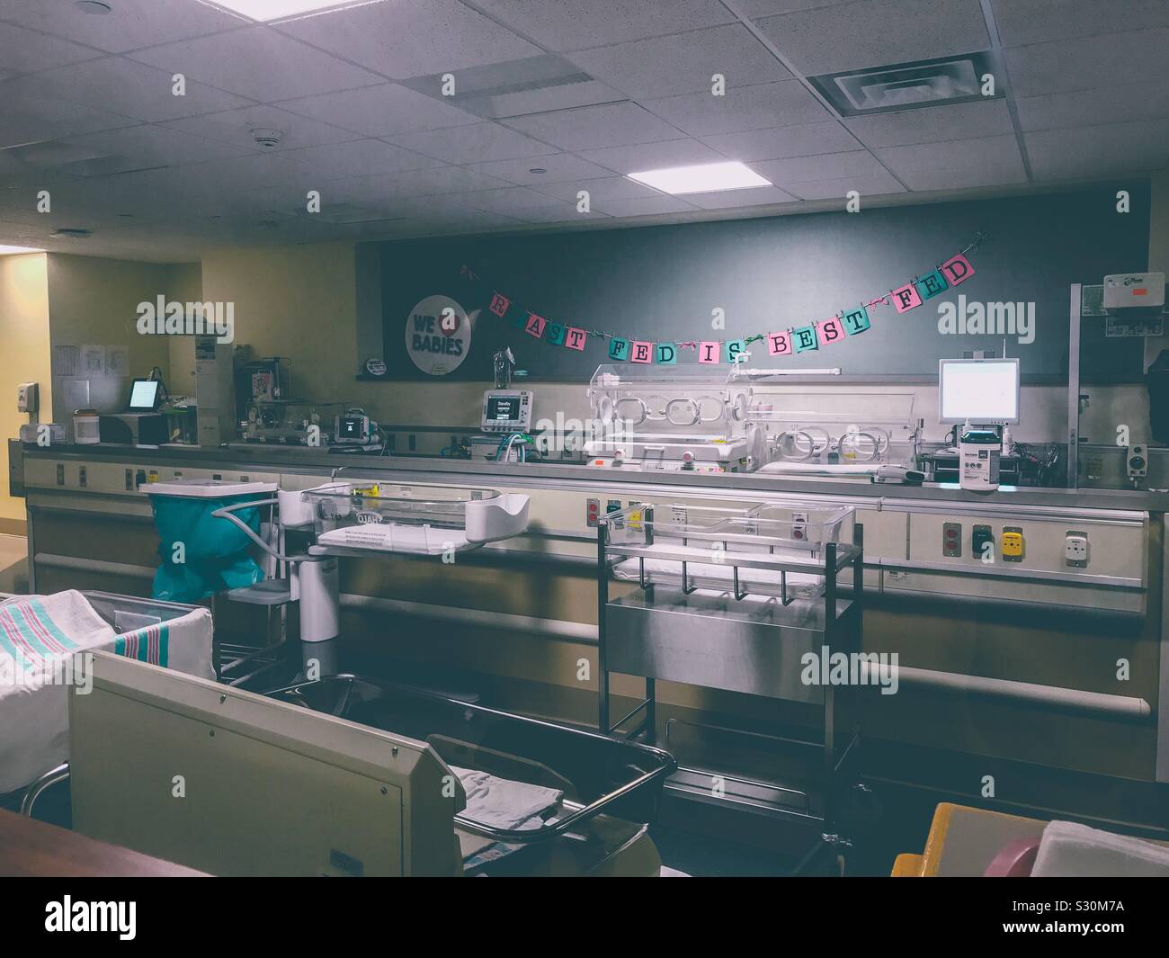 Behind the window of the baby viewing room on maternity ward - Smartphone Captured Stock Image